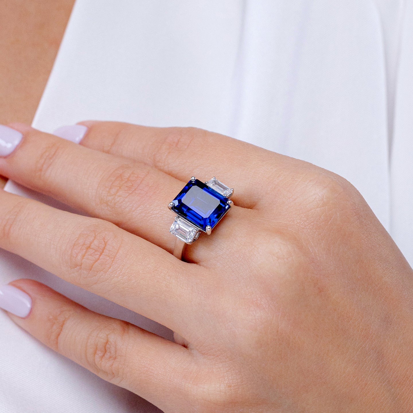 Lab-Grown Emerald-Cut Blue Sapphire and Lab Diamond Three Stone Ring