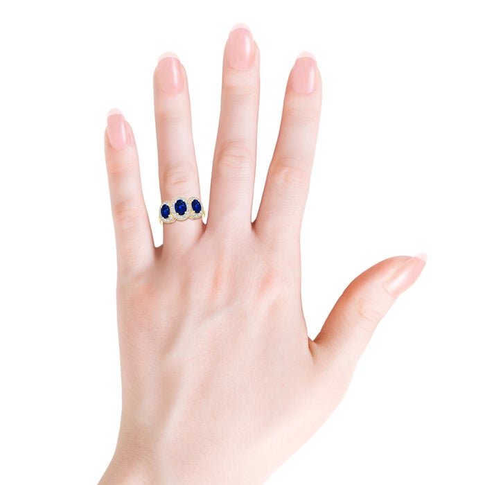 Lab-Grown Classic Three Stone Blue Sapphire Ring with Diamond Halo
