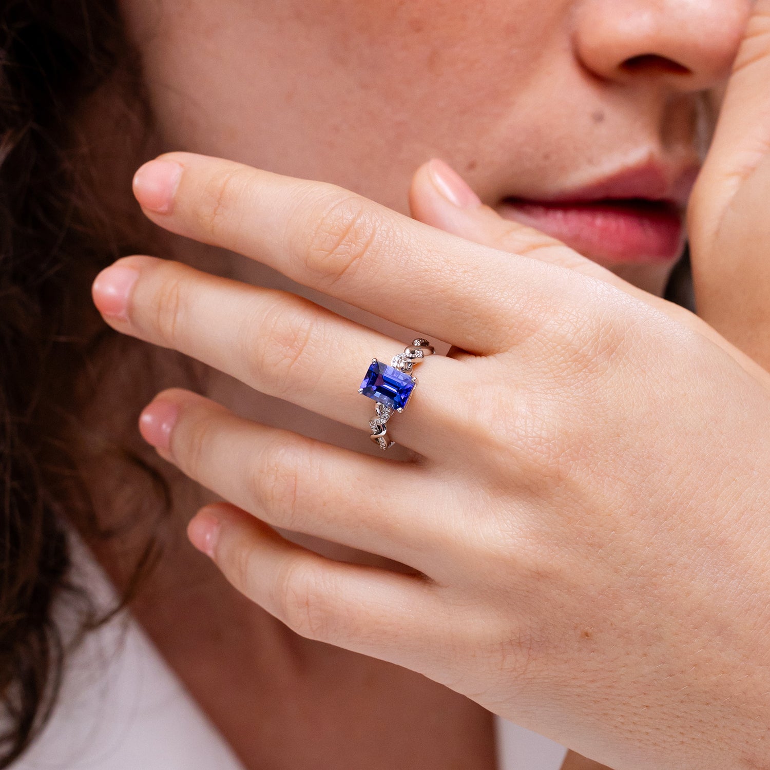 Emerald-Cut Solitaire Tanzanite Infinity Twist Ring